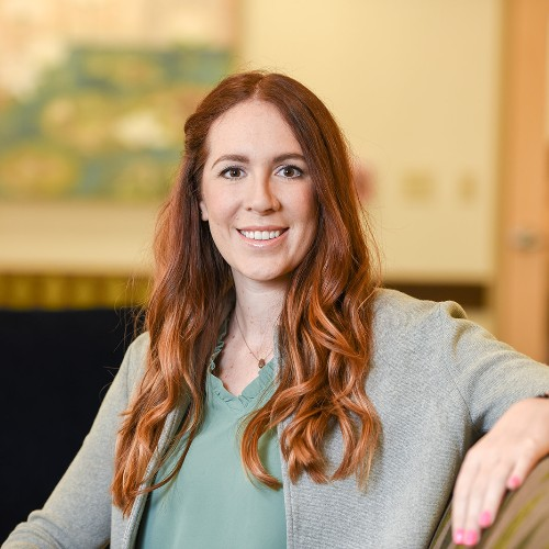 Erin Moran, Vice President of Clinical Operations at Sophros Recovery seen in a blue color shirt and long loose hair style